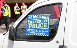 Seized by police sticker on vehicle window